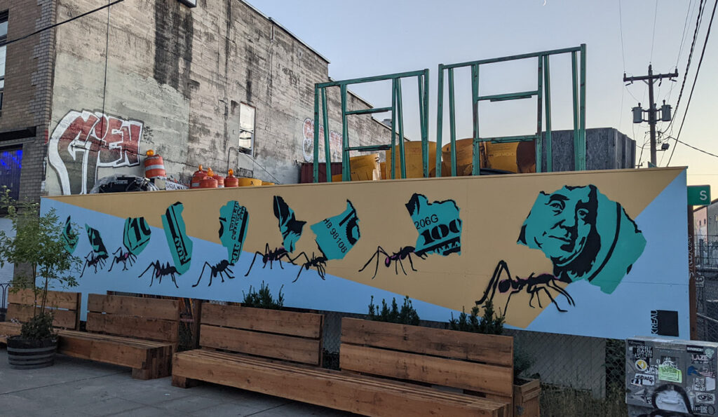 georgetown_012 wide view of stencil mural, 9 leaf cutter cants carrying torn pieces of a hundred dollar bill